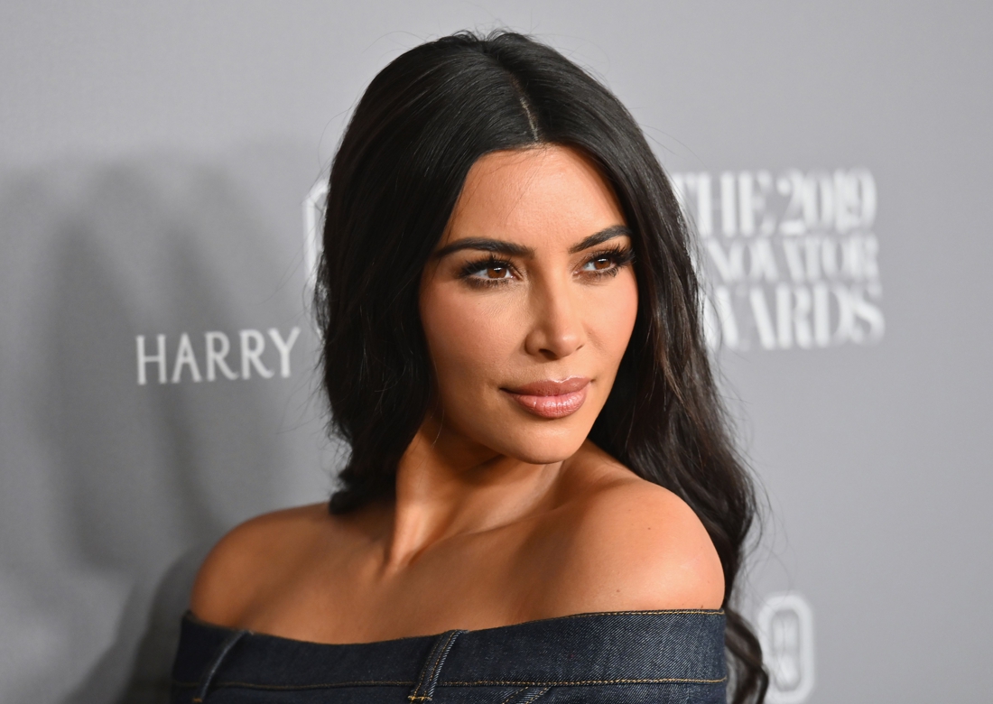 Kim Kardashian opts for a dress with a large photo of herself