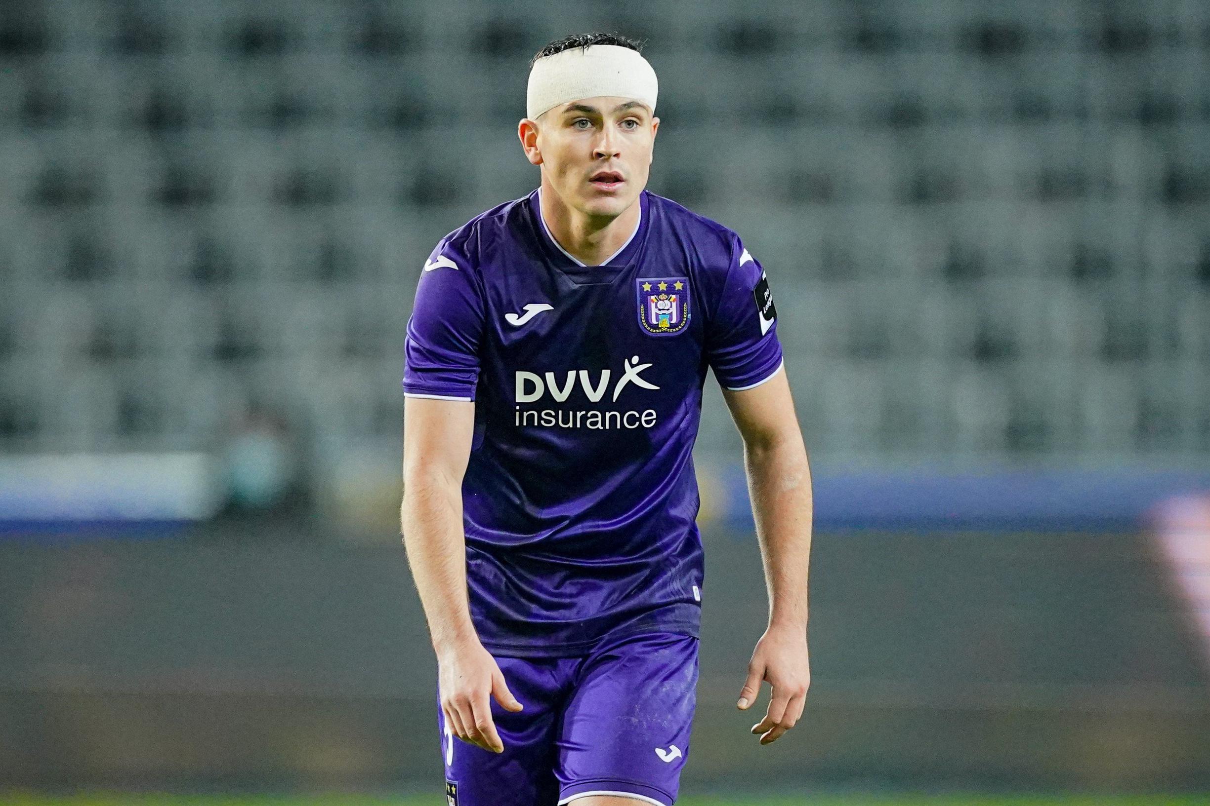 OHL's Xavier Mercier and Anderlecht's Josh Cullen fight for the