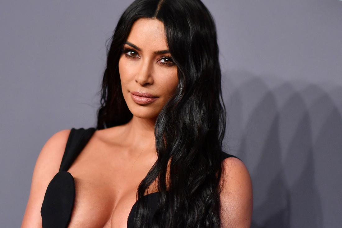 Unrecognizable Kim Kardashian with blond hair and pale eyebrows…