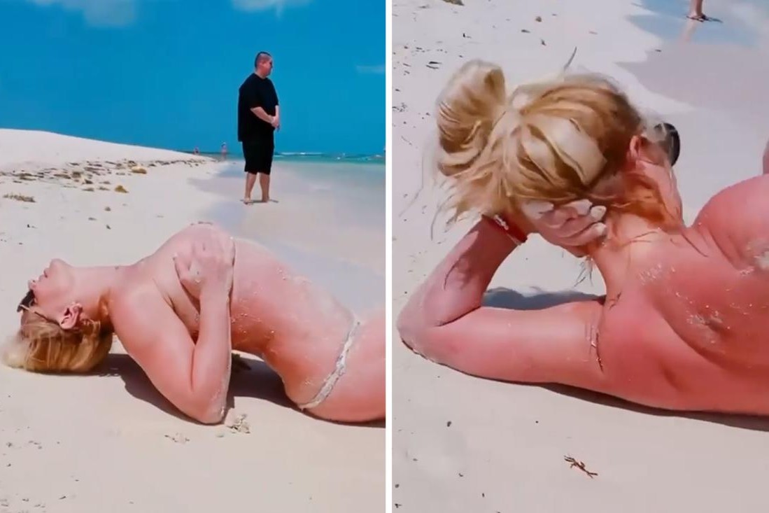 Britney Spears topless on the beach, but fans focus on something else