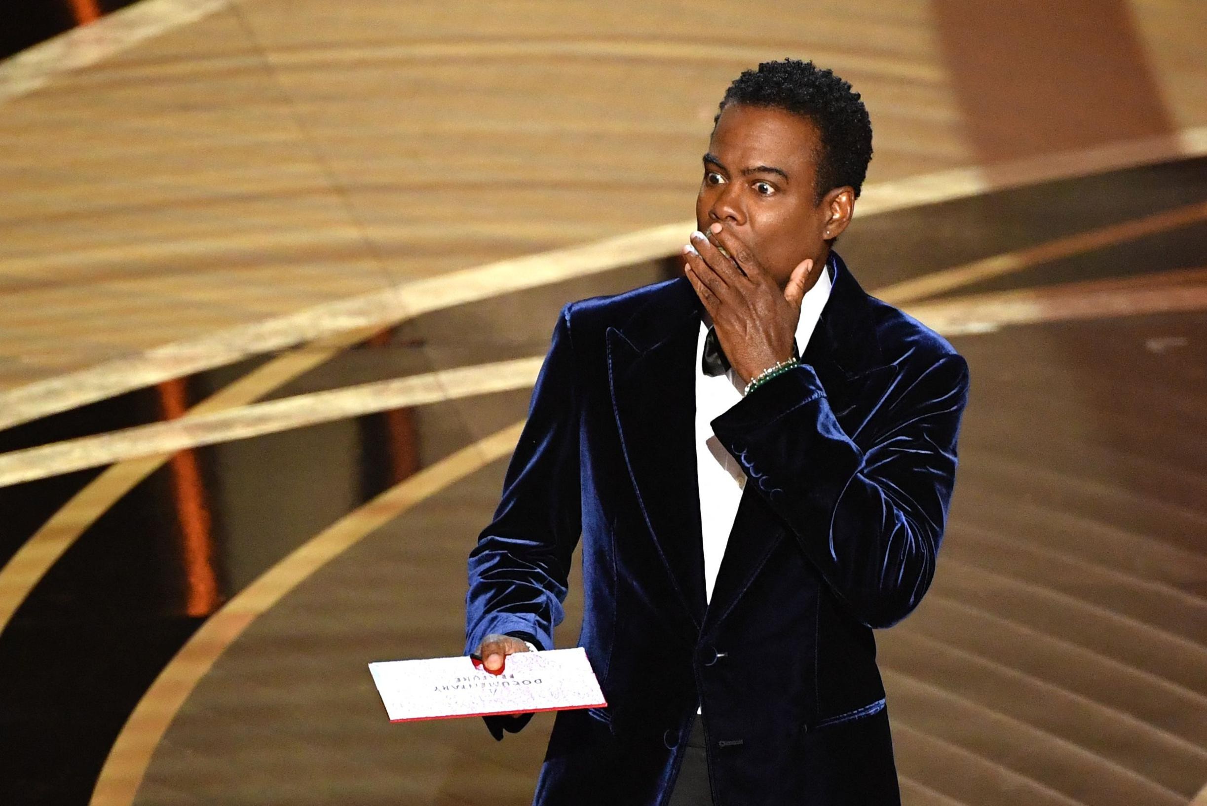 Chris Rock laughs away Oscar blow: “I have my hearing back”