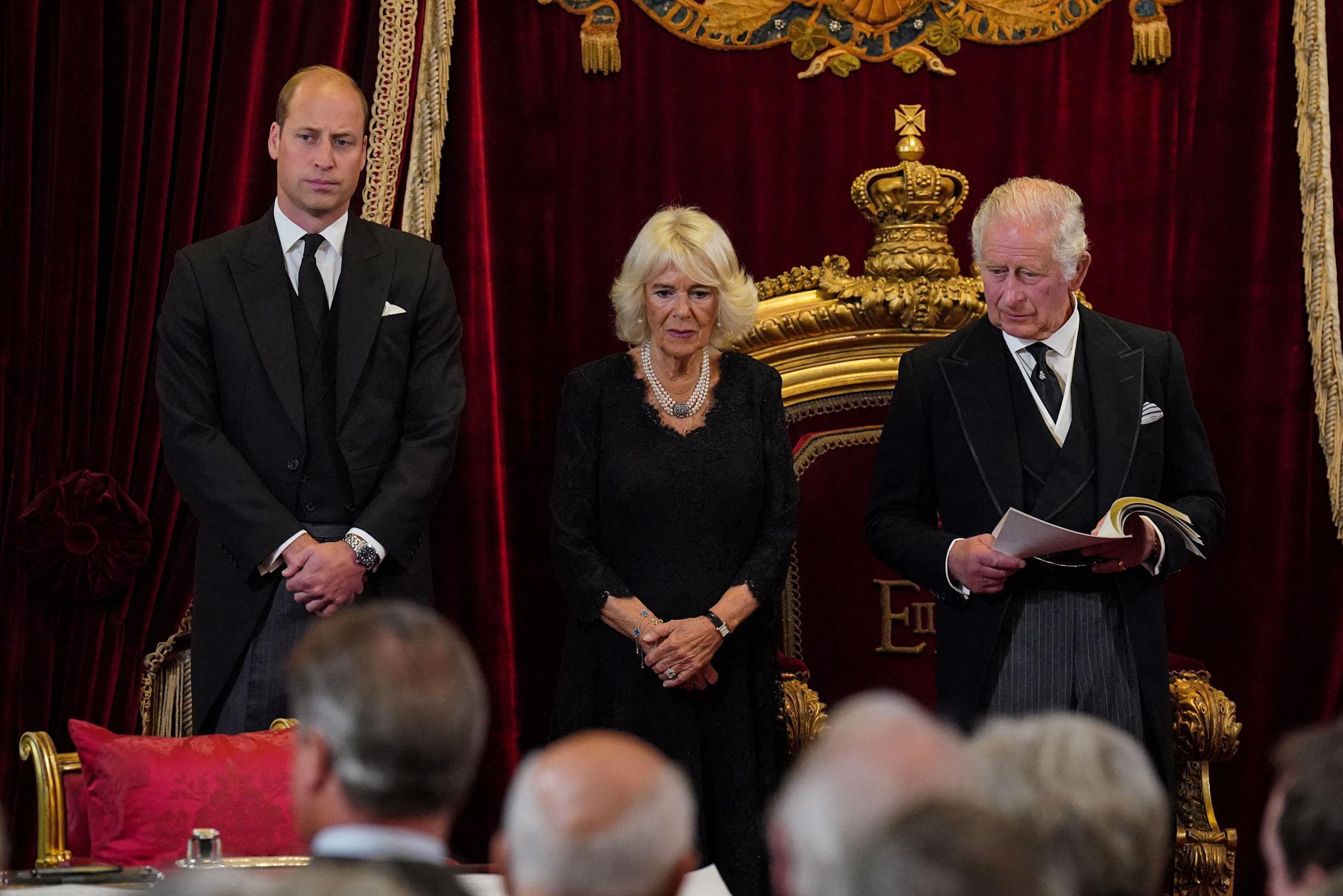 British King Charles gives his wife Camilla, son William and daughter-in-law Kat