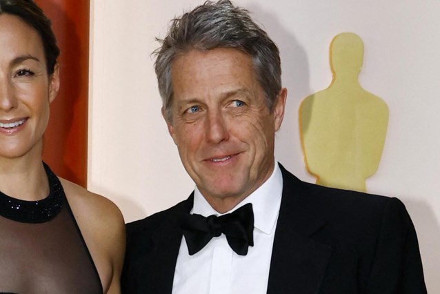 Interviewed by Hugh Grant on the Oscars red carpet: “Who do I wear? My suit”