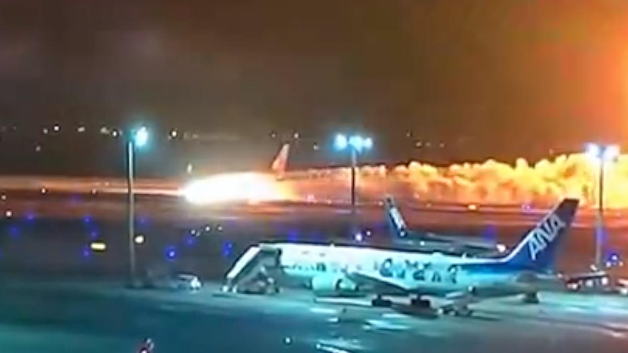367 passengers evacuated after plane catches fire during landing at Tokyo airport